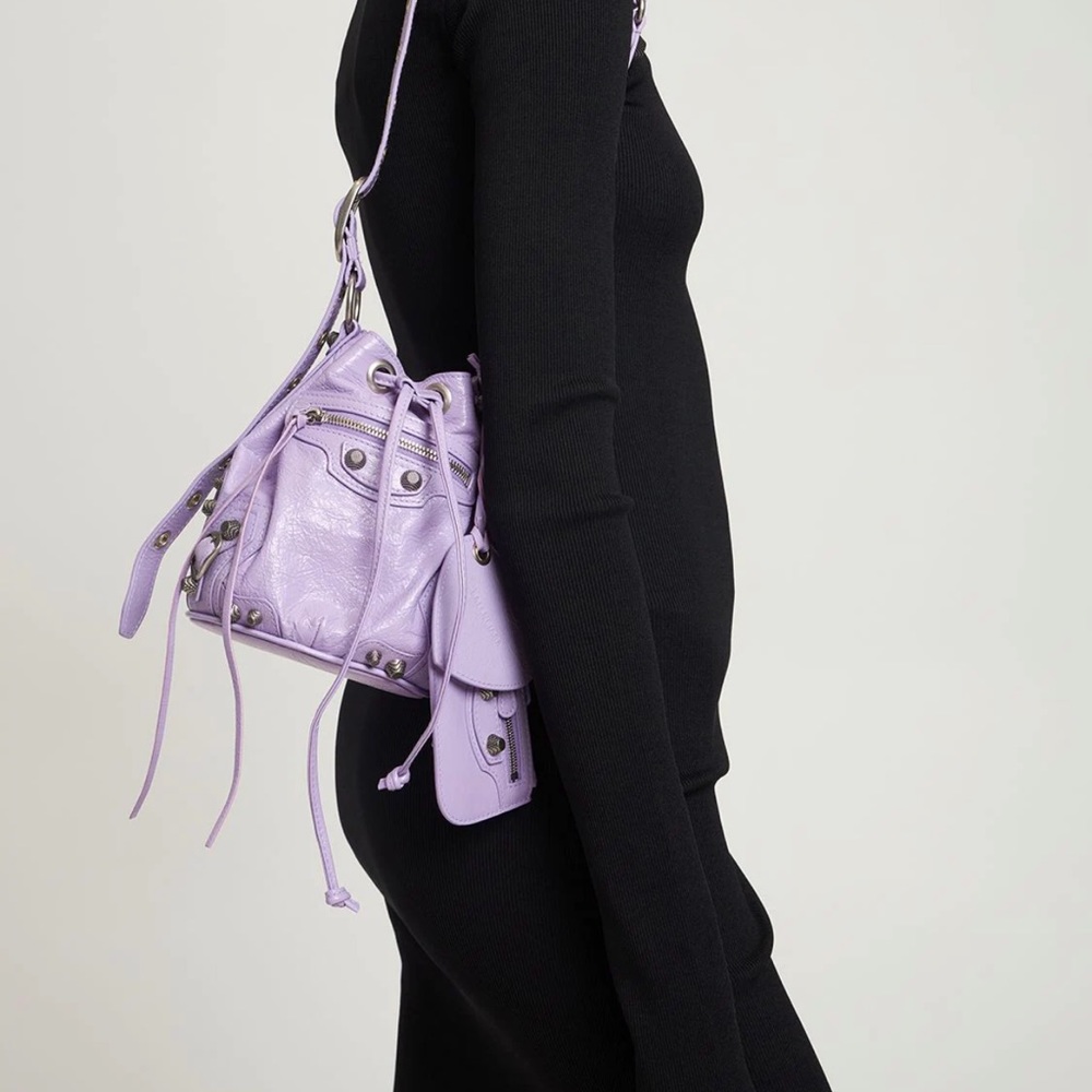 Balenciaga
XS Le Cagole leather bucket bag lilac